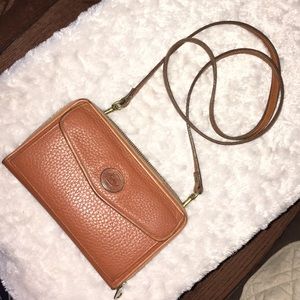 Vintage Dooney and Bourke zip along wallet