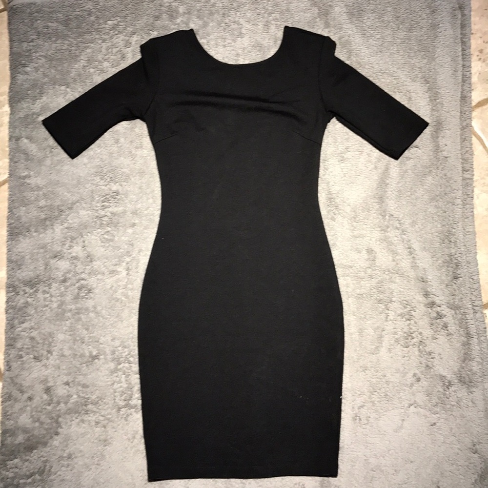 PRICE FIRM. Bodycon dress with shoulder pads