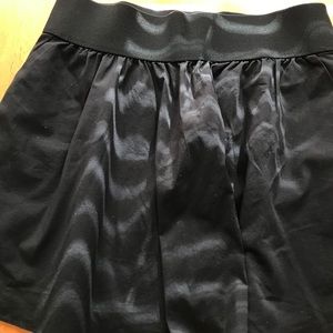 EXPRESS SIZE LARGE SKATER SKIRT WITH POCKETS.