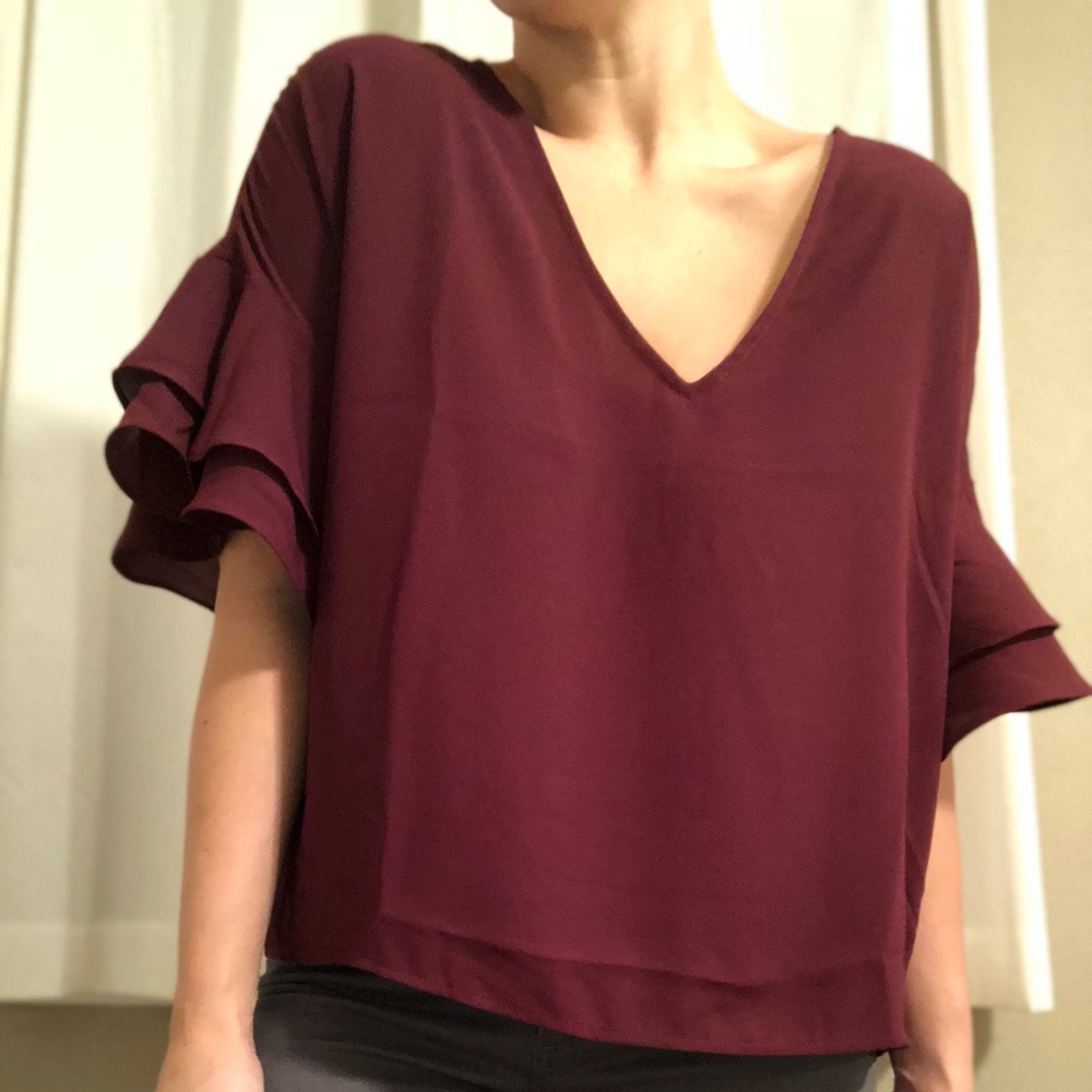Maroon ruffled blouse