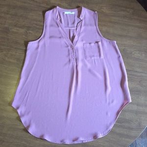 Blush colored sleeveless blouse