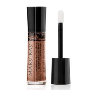 Lip gloss - rich spice. BUY 2 GET 1 FREEon glosses