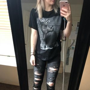 Black graphic T-shirt of cat on wrecking ball