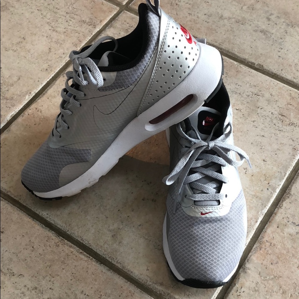 Silver NIKE tennis shoes