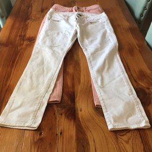 2 pairs of American rage stretch jeans.