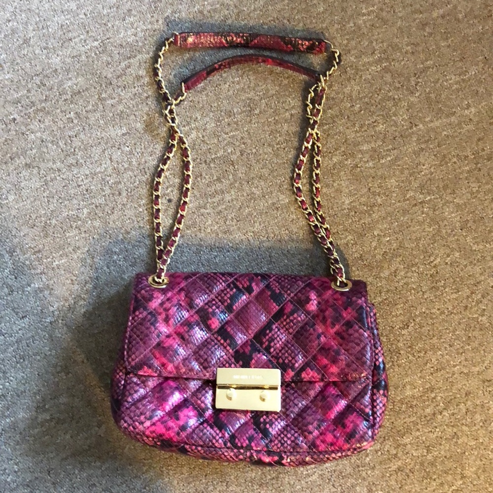 Magenta and Black Micheal Kors purse, snake skin
