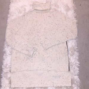 Turtle neck sweater with side zippers