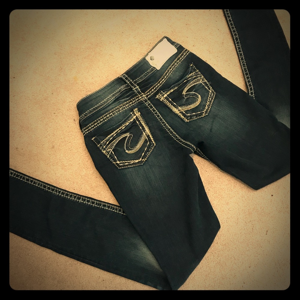 Dark wash Silver skinny jeans