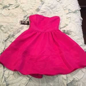 Pink strapless dress with pockets. Size 0