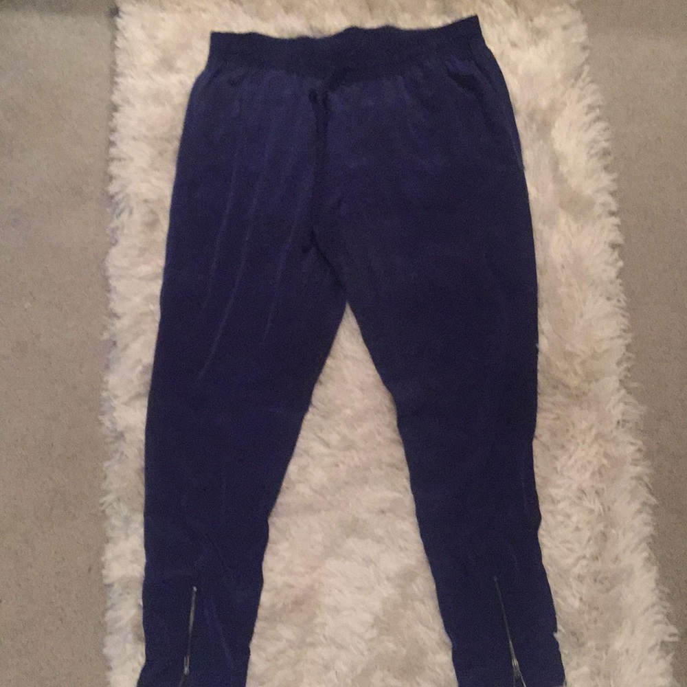 Blue polyester dress pant w/ ankle zipper detail