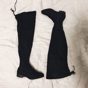 Black over the knee boots.