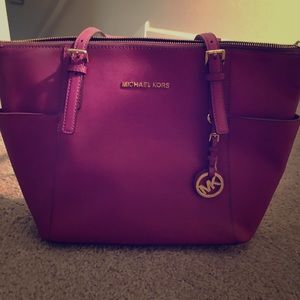 Authentic purple Michael Kors bag