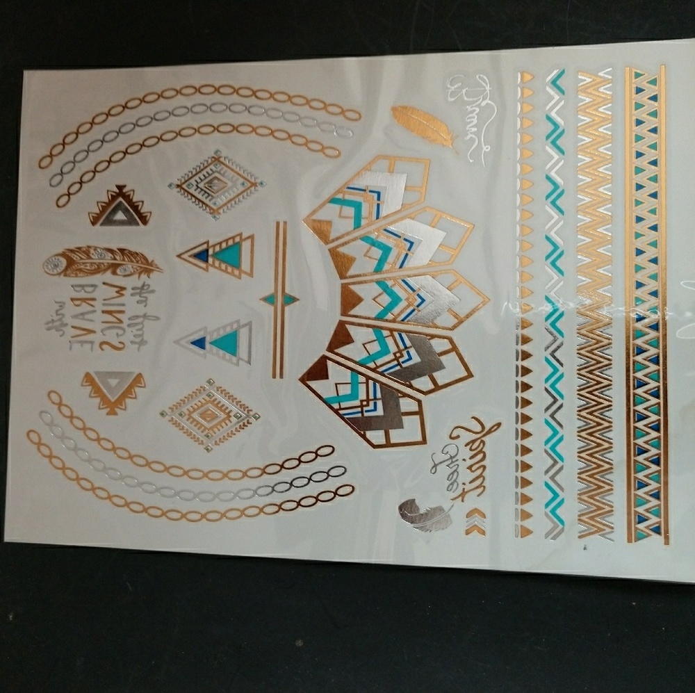 Temporary tattoos free with any $15 + purchase