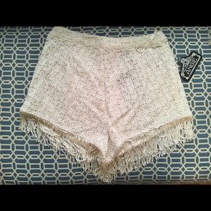White fringe shorts
