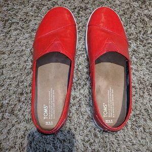 Toms red vinyl Slip Ons