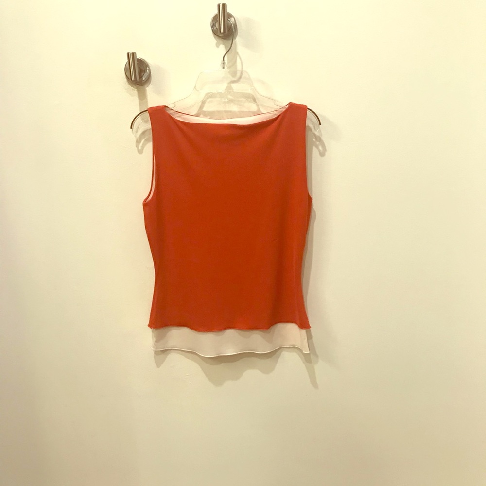 Orange and white sleeveless top