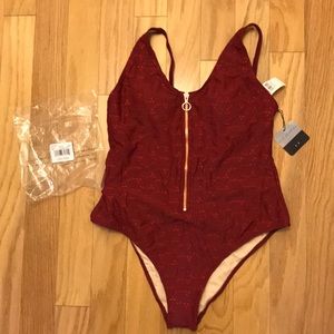 Embroidered one piece suit