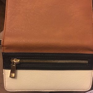 Wallet with cell phone slot
