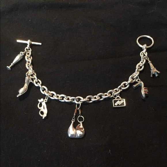 Solid Sterling Silver charm bracelet. - Picture 1 of 2