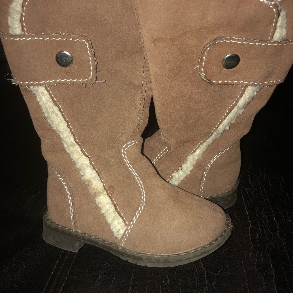 Three pairs of baby shoes. Good condition.