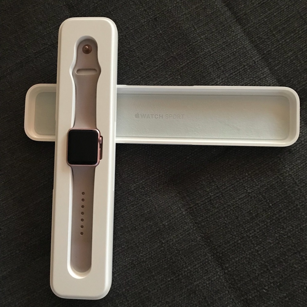 LIKE NEW Rose gold 38mm Apple Watch series 1.