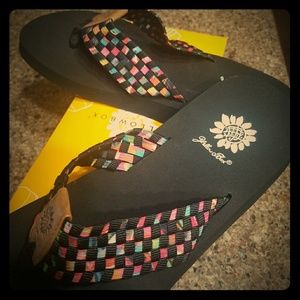 Never been worn adorable yellowbox flip flips