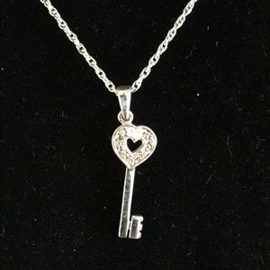 Small sterling silver heart key necklace