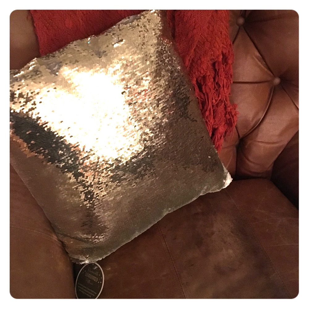 Gold reversible sequined pillow