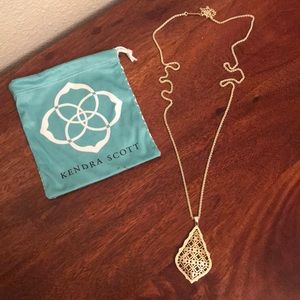 Kendra Scott necklace.