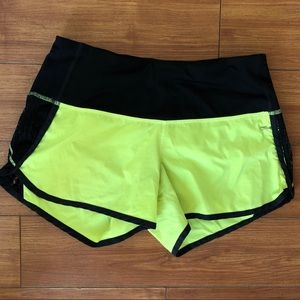 Lululemon neon yellow & black shorts. Size 4