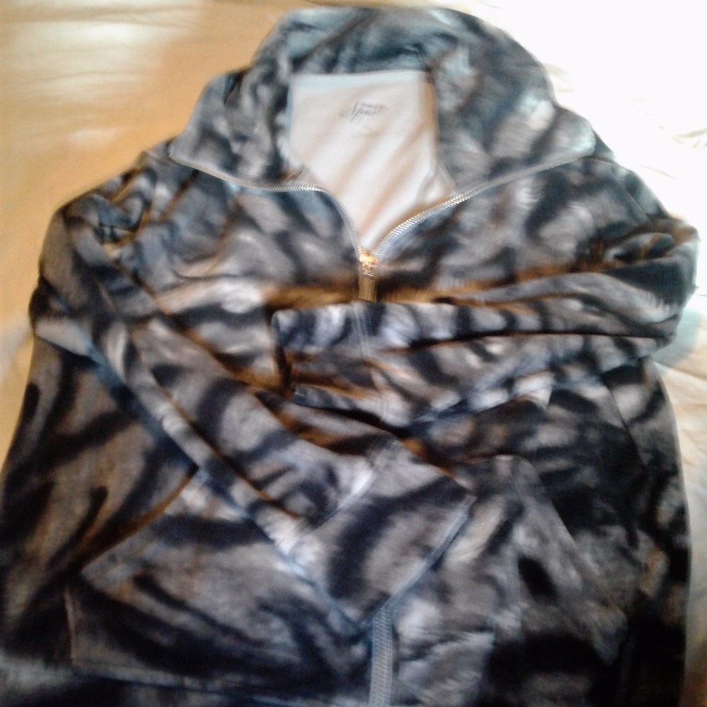 Fleece zip up sweater, very soft no tags.