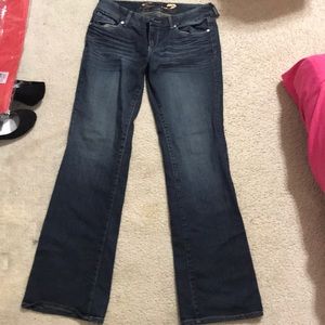 Medium wash Boot cut mom jeans