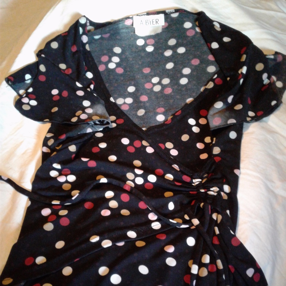 Polka dot top with tie string, rayon, very soft.