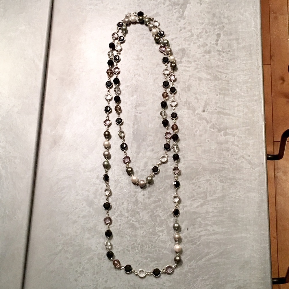 Long necklace.  Lots of versatility.