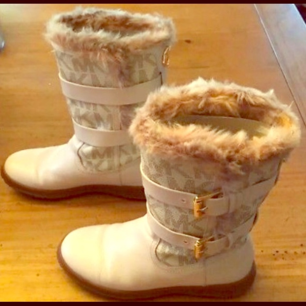 Michael Kors winter boots never worn.