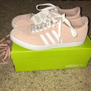 Pink and white Adidas sneakers