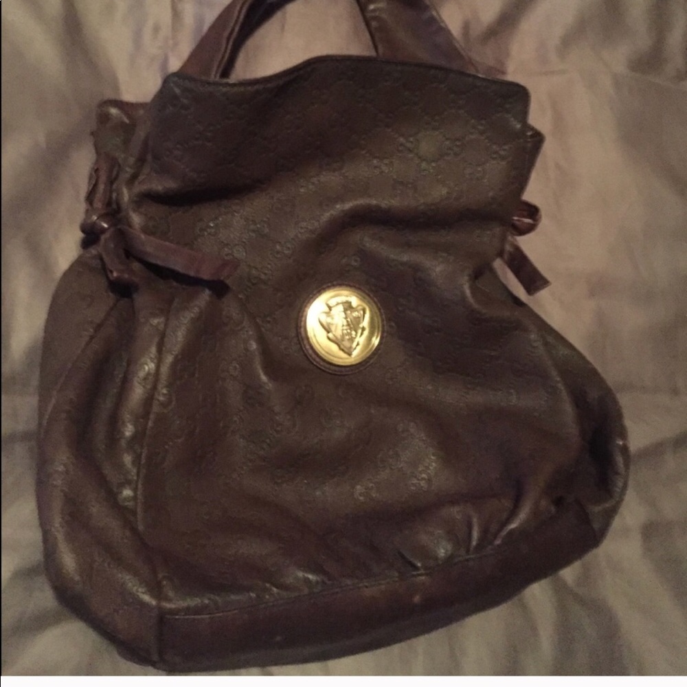 Gucci shoulderbag. Brownish/purple color
