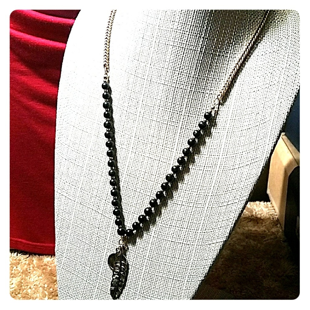 ALDO feather and black bead necklace