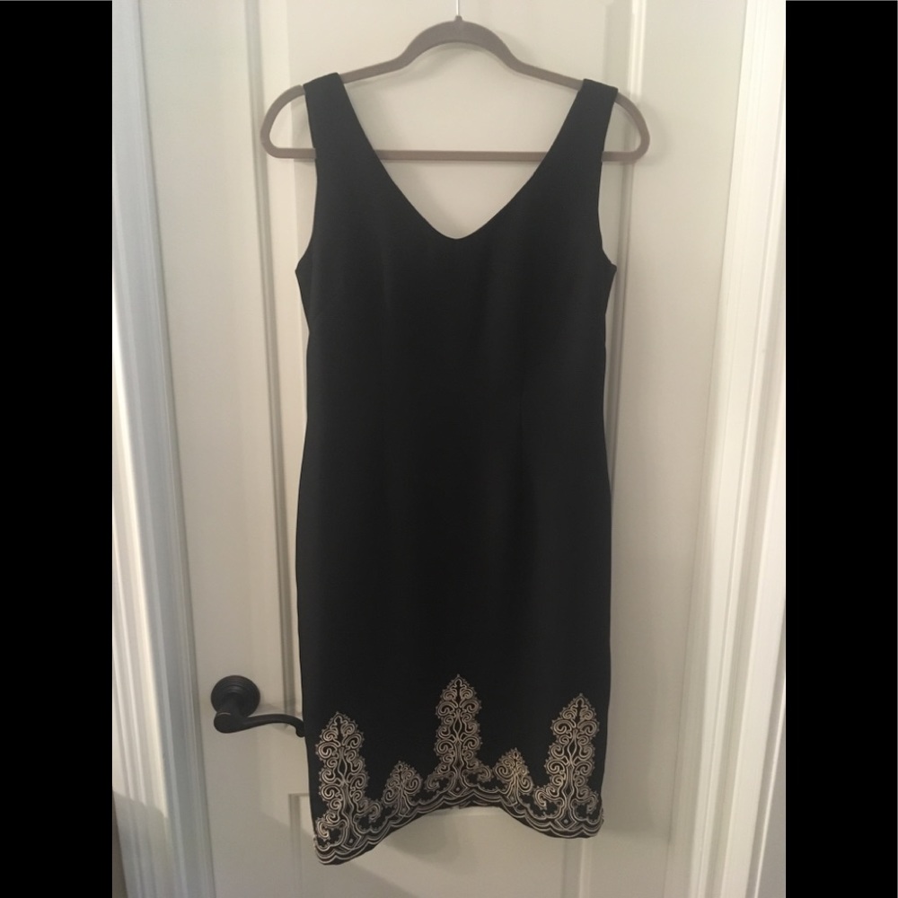 Elegant black dress with threaded lace detailing