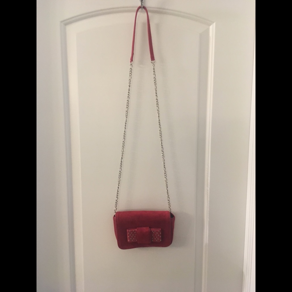 White House Black Market raspberry colored clutch