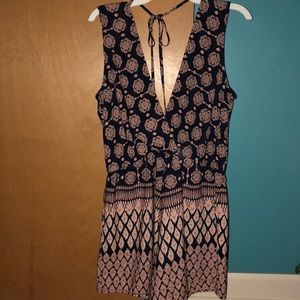 Trendy pink and navy romper