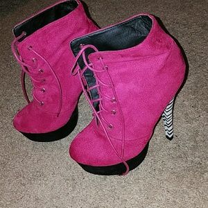 Pink and black stilettos with zebra print heel