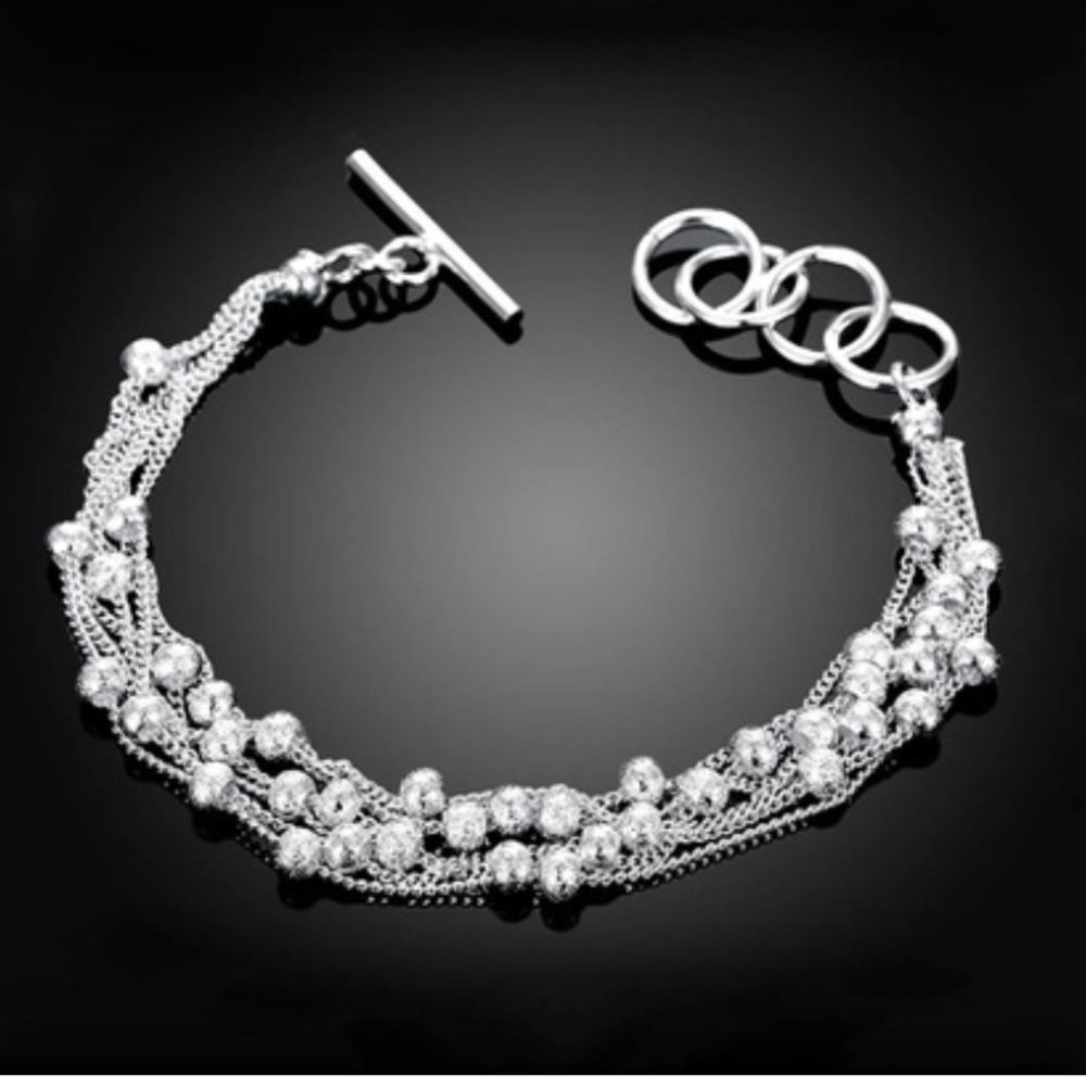 Silver Plated Dangling Glitter Bracel NWOT