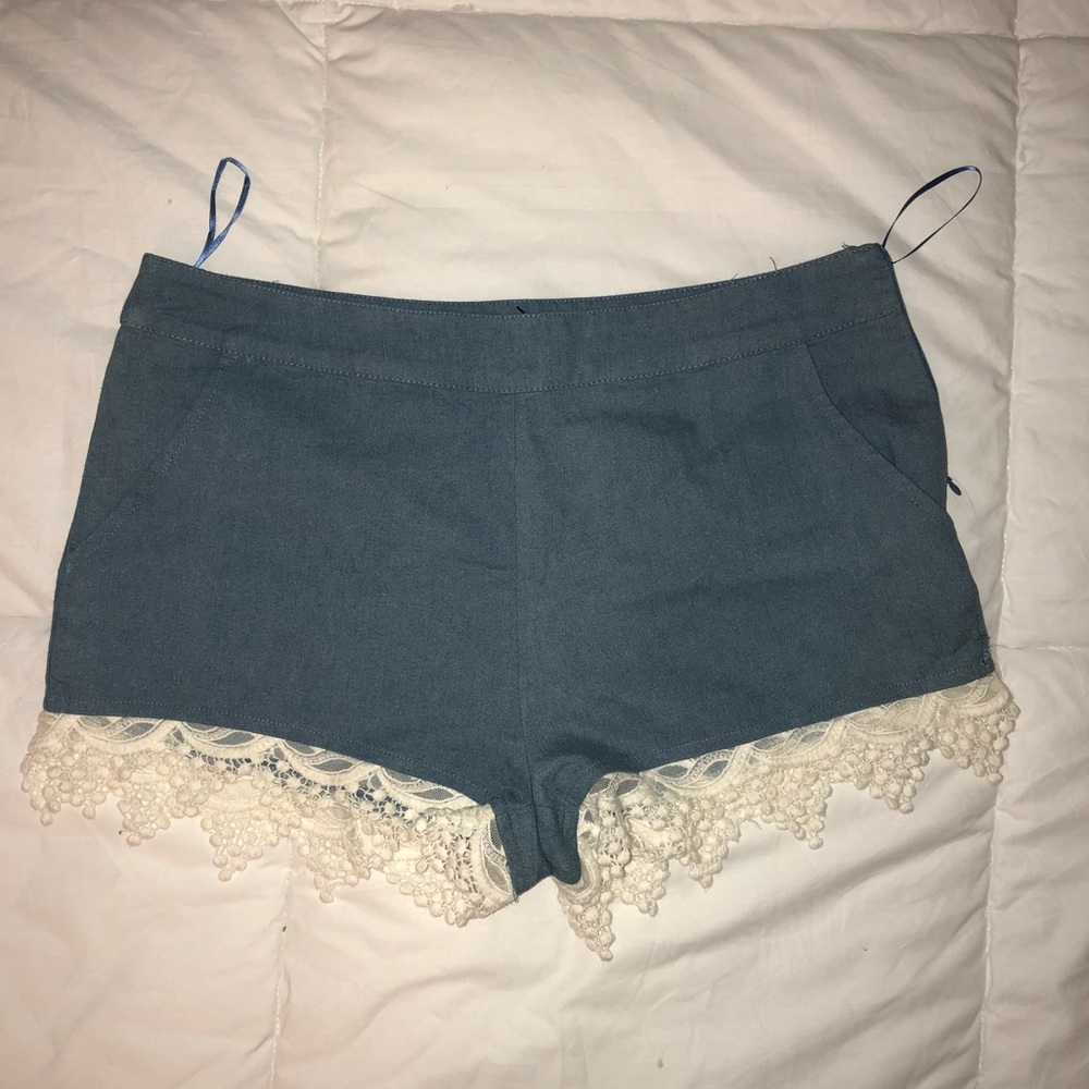 Denim lace hemmed shorts size M NWT