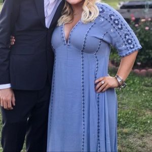 Midi dress. Blue. Low cut. Floral embellishments