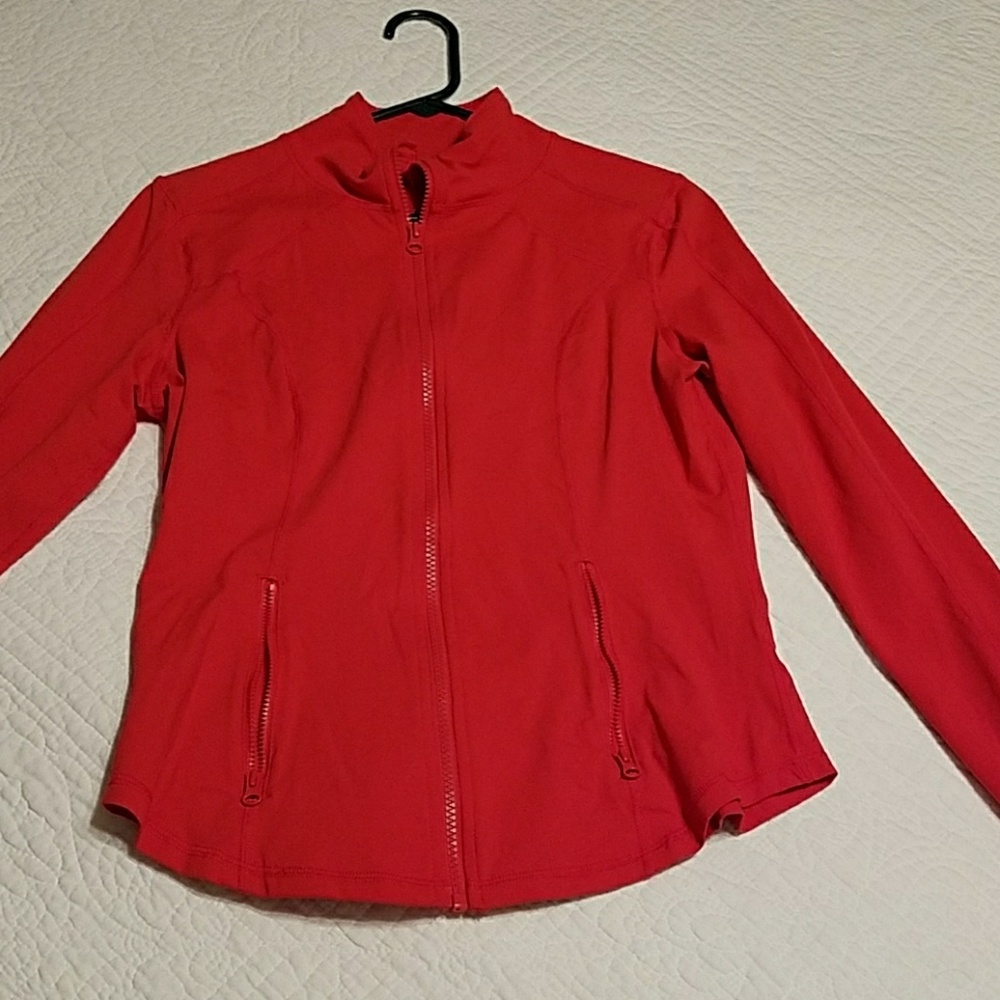 Reddish lightweight, workout jacket.