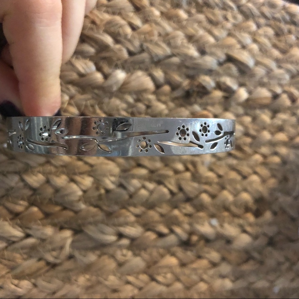 Swatch bracelet.