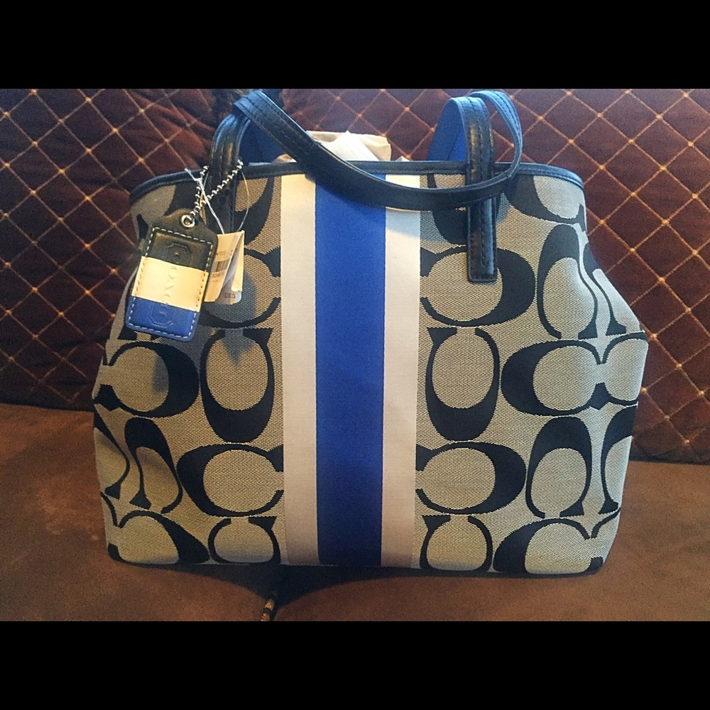 Auth. NWT- Coach Purse, with duster bag and box.
