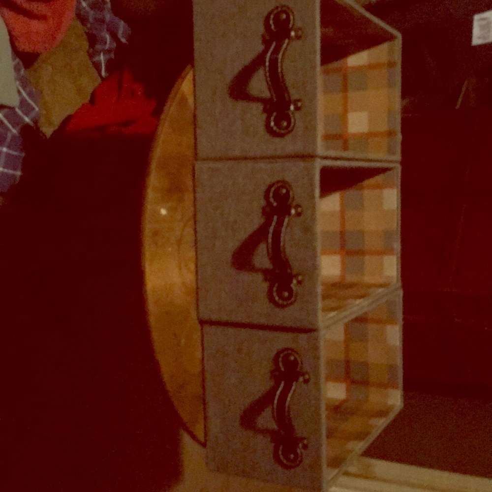 Three decorative storage boxes