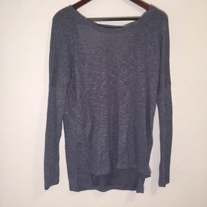 Knitted blue long shirt.